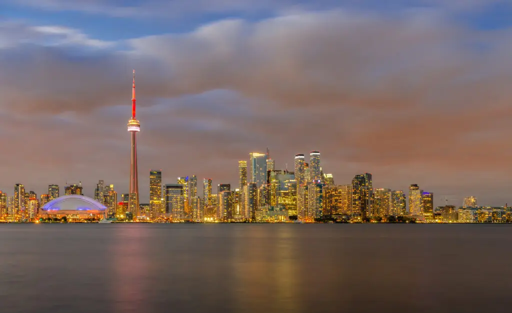 Skyline of Toronto Downtown over Ontario Lake at sunset, Toronto, Canada